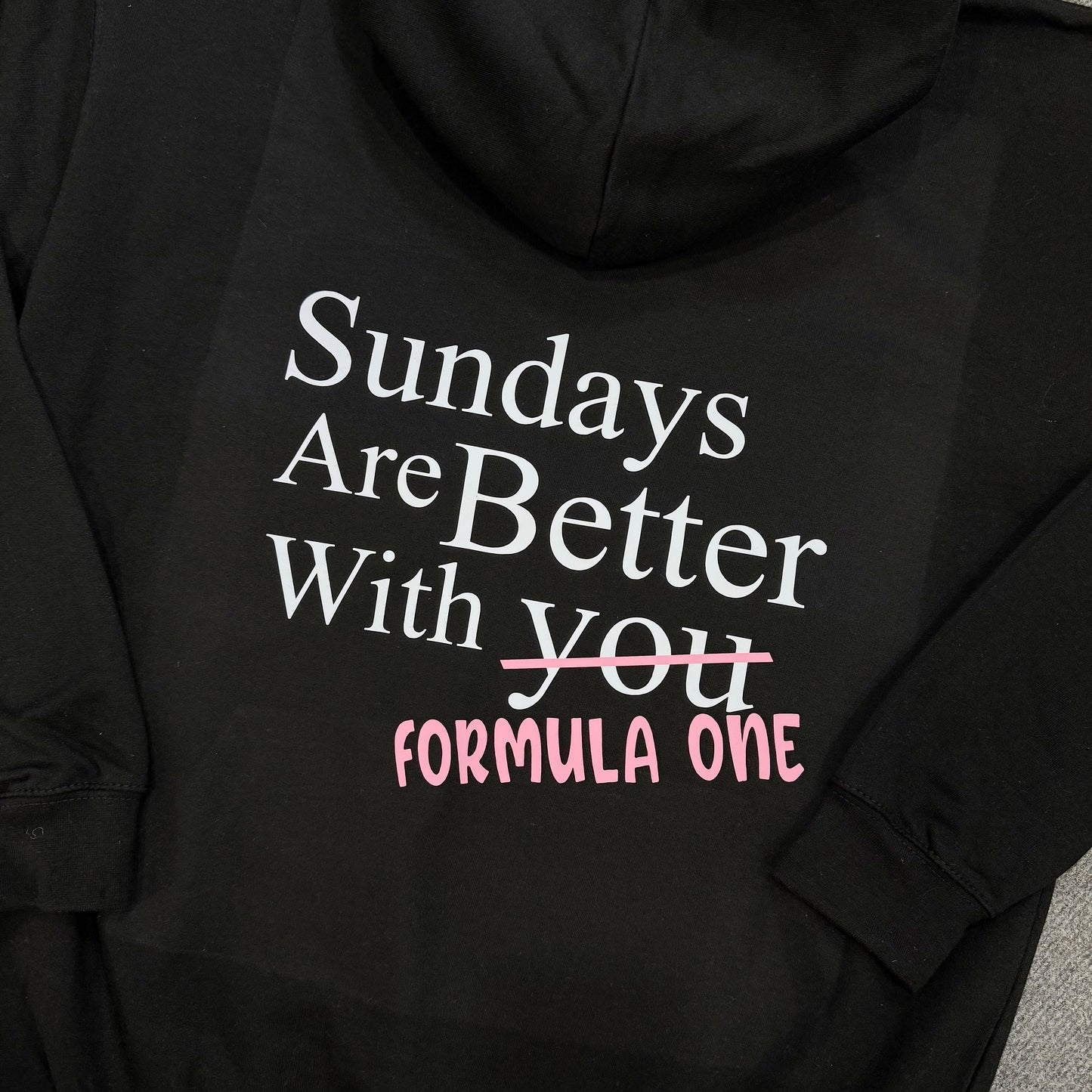 Black hoodie with white and pink text on the back, hoodie text reads 'Sundays Are Better With you FORMULA ONE'