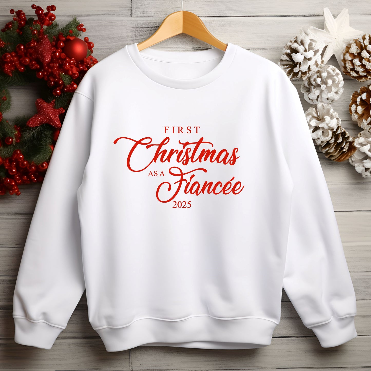 Women’s cozy Christmas sweatshirt with engagement-themed Fiancée text