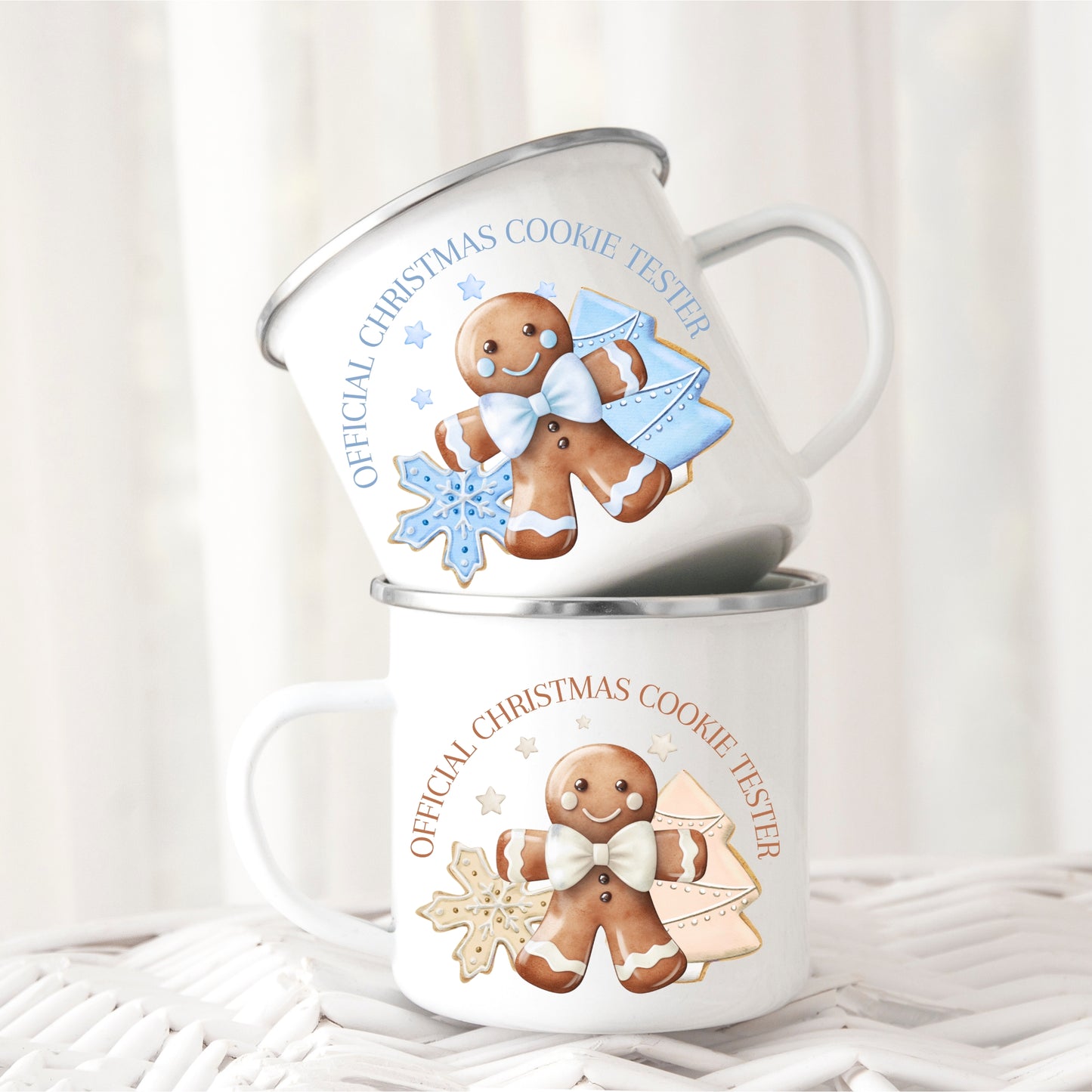 Two white mugs with gingerbread man design and text on a white background