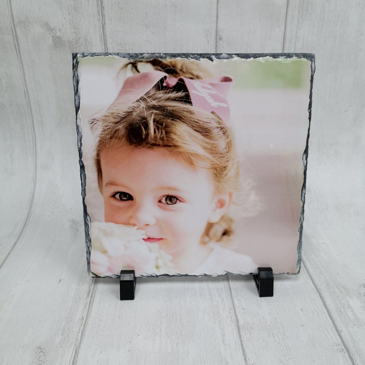 Rock slate with young child photo