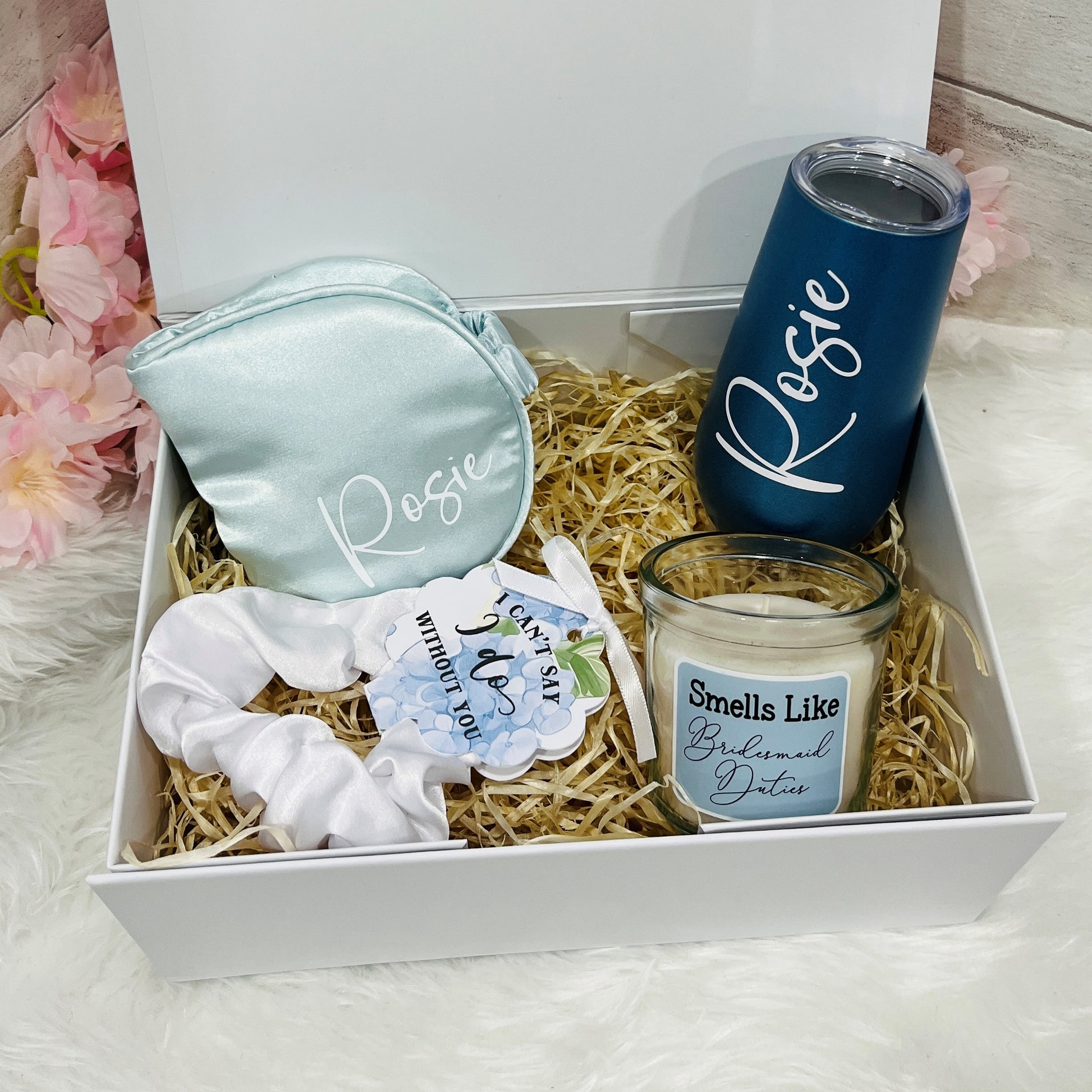 Bridesmaid Gift set with 'Rosie' branded items including a tumbler, face mask, hair scrunchie and candle in a box.