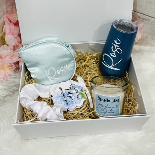 Bridesmaid Gift set with 'Rosie' branded items including a tumbler, face mask, hair scrunchie and candle in a box.