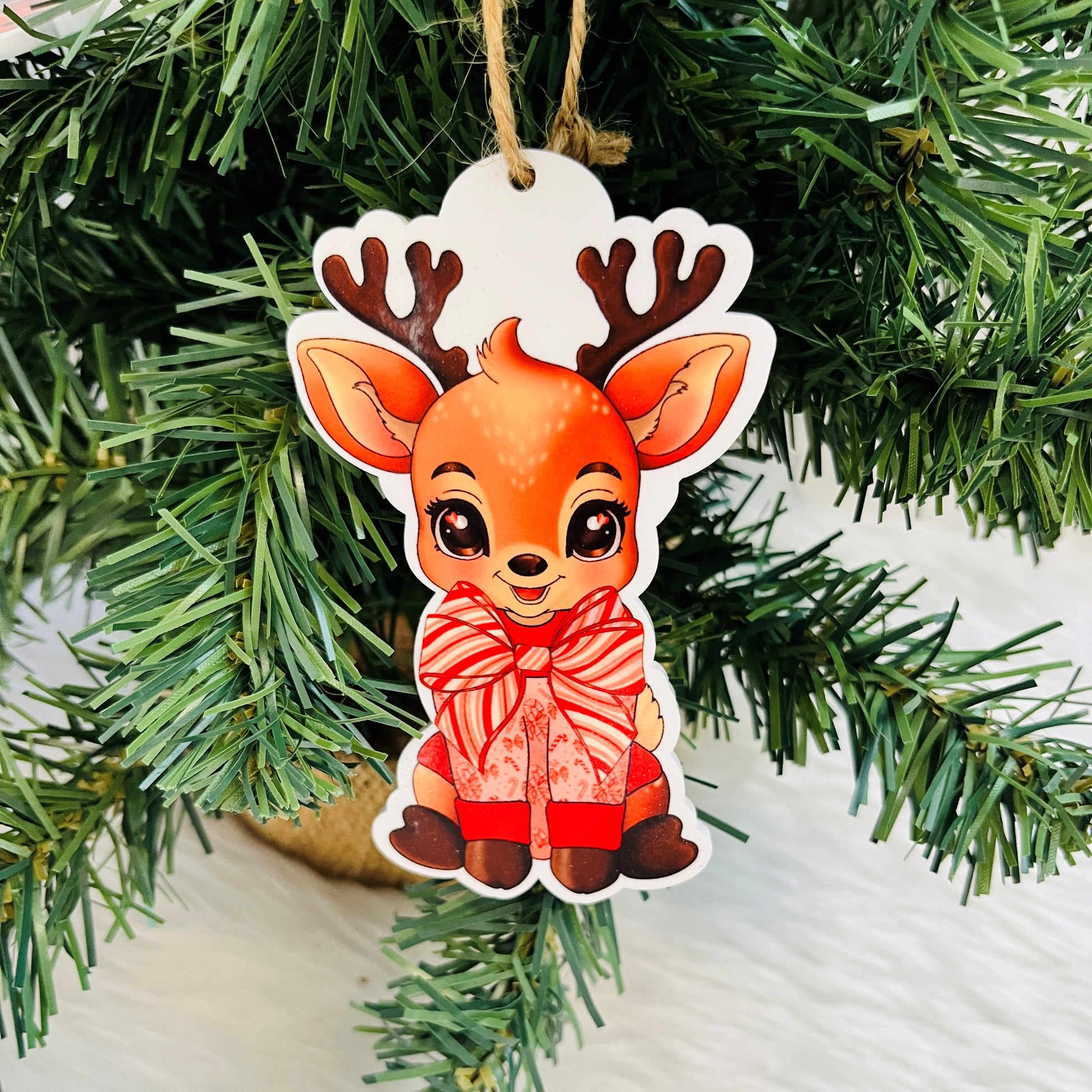 Festive acrylic reindeer ornament with ribbon hanger