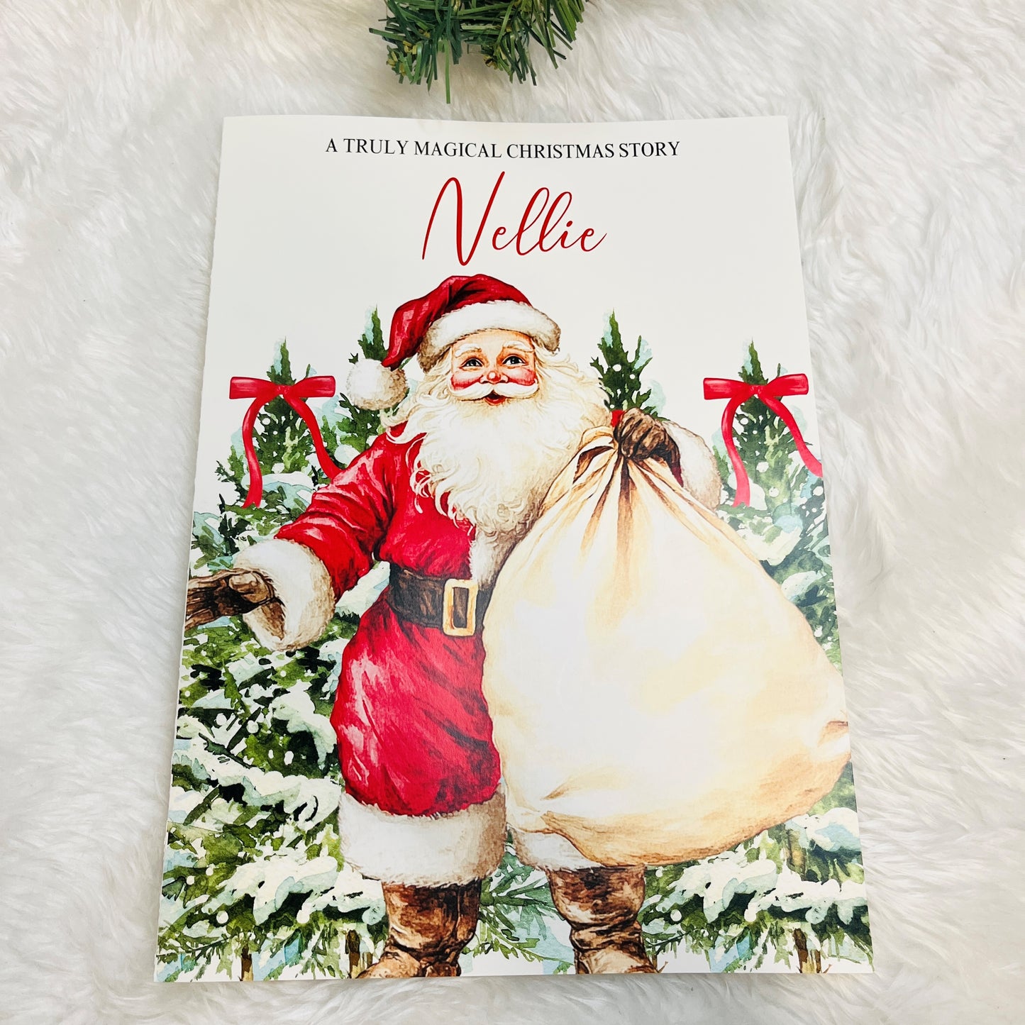 Book cover with Santa Claus holding a sack against a snowy background, titled 'A Truly Magical Christmas Story Nellie'.