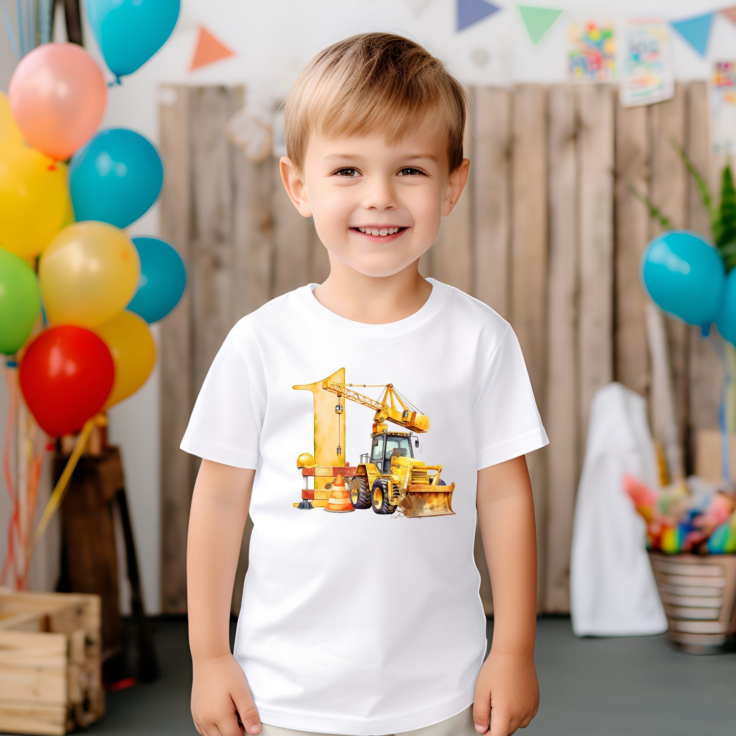 A child wearing a white 
T-shirt with a digger image and the number 1 on the front 