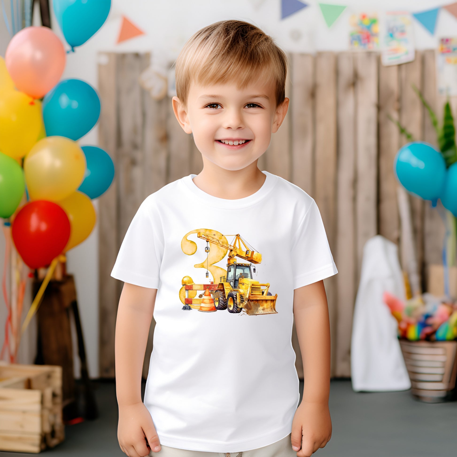 A child wearing a white 
T-shirt with a digger image and the number 3 on the front 