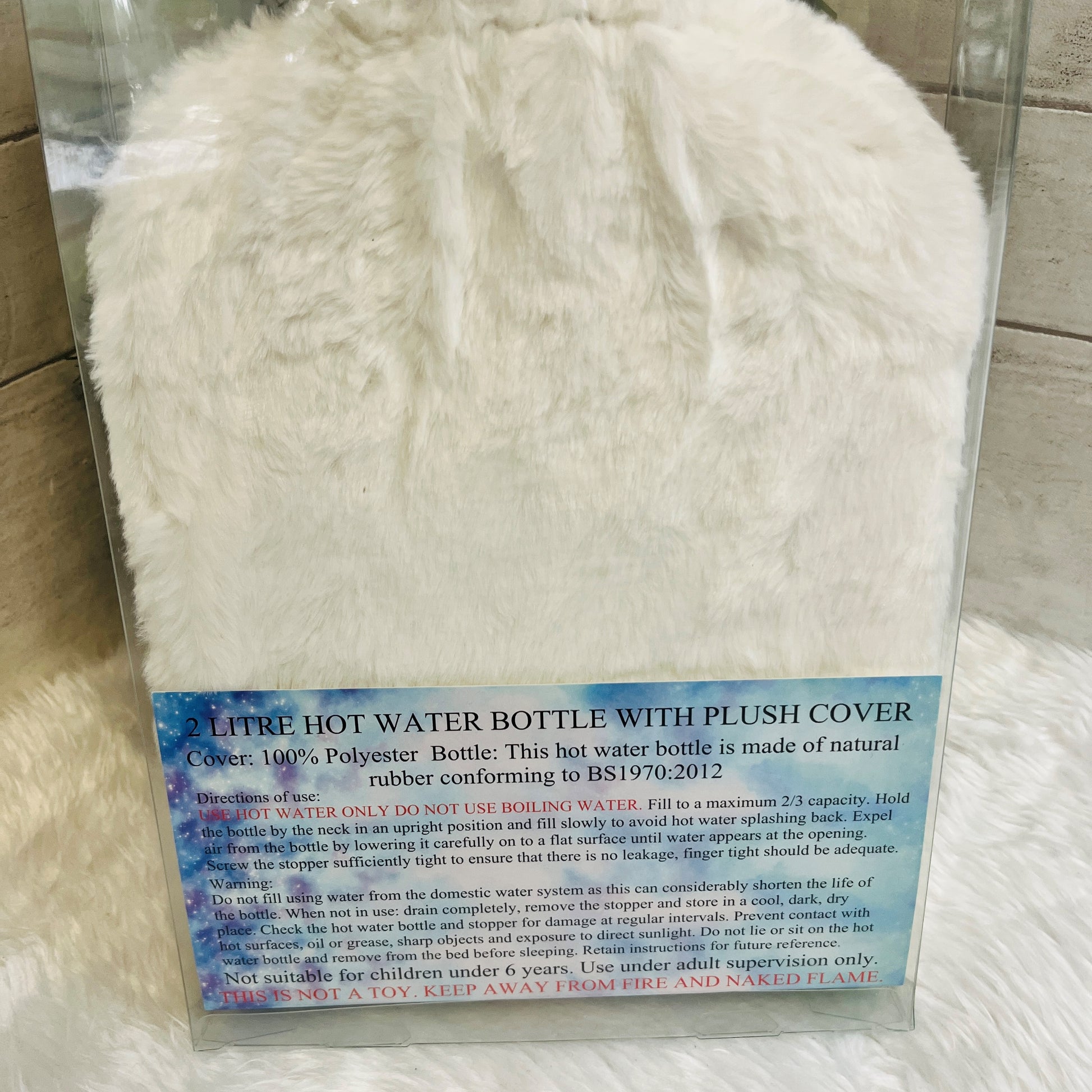 Hot Water Bottle Care Instructions inside clear packaging