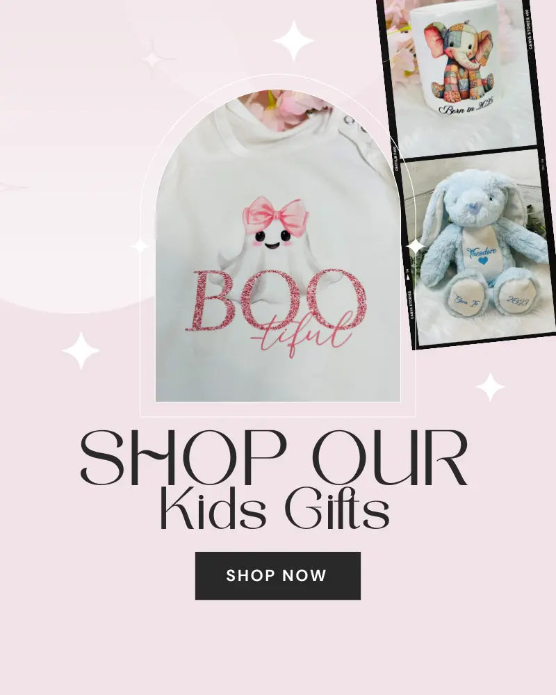 Children's sleepsuit with 'BOO tiful' text and a teddy bear on a pink background with 'Shop Our Kids Gifts' text.