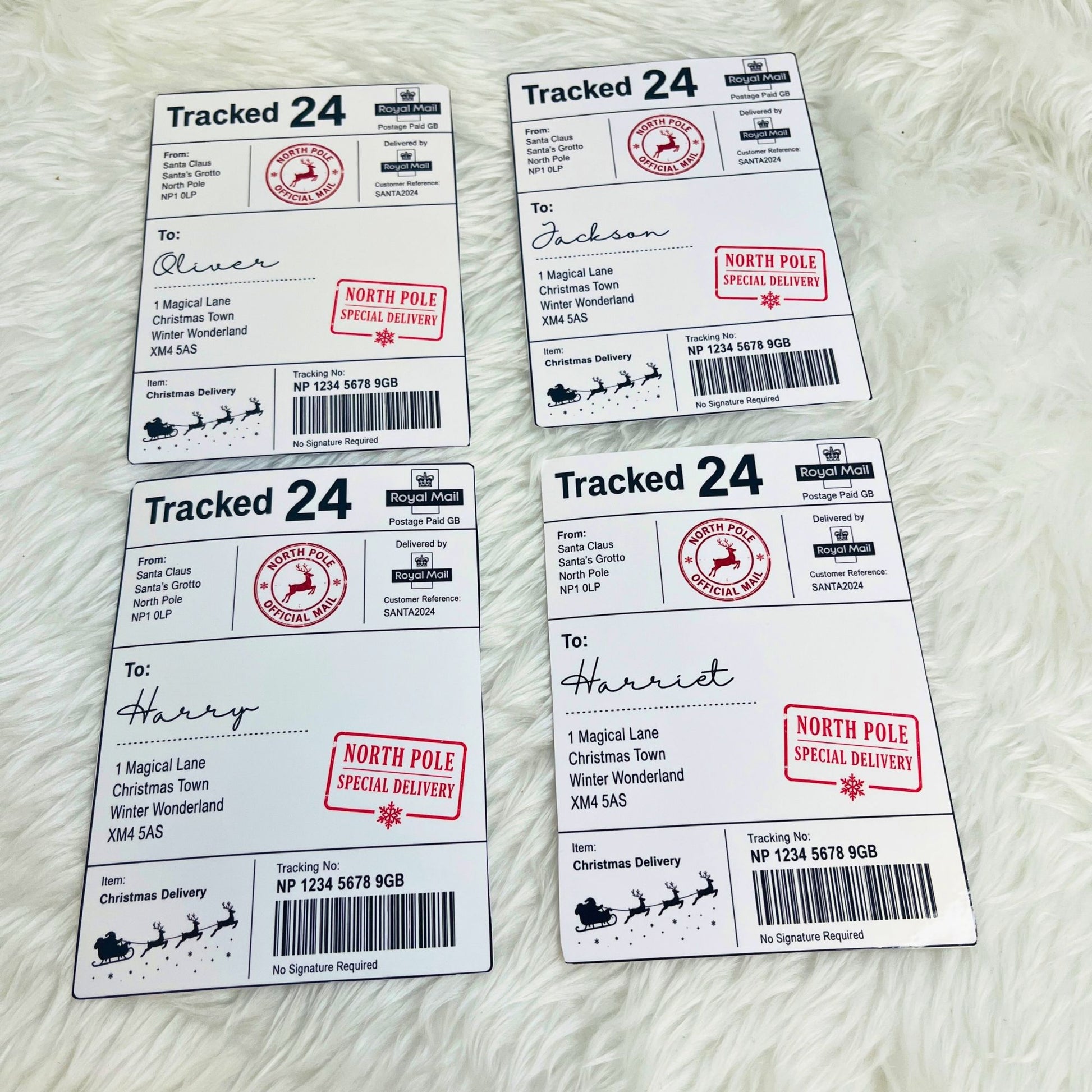Four personalized Christmas shipping labels for Santa, arranged in a 2x2 grid on a white faux fur background. Each label features a 'Tracked 24' status bar, a red 'North Pole Special Delivery' stamp, and a black Santa Claus sleigh graphic at the bottom.