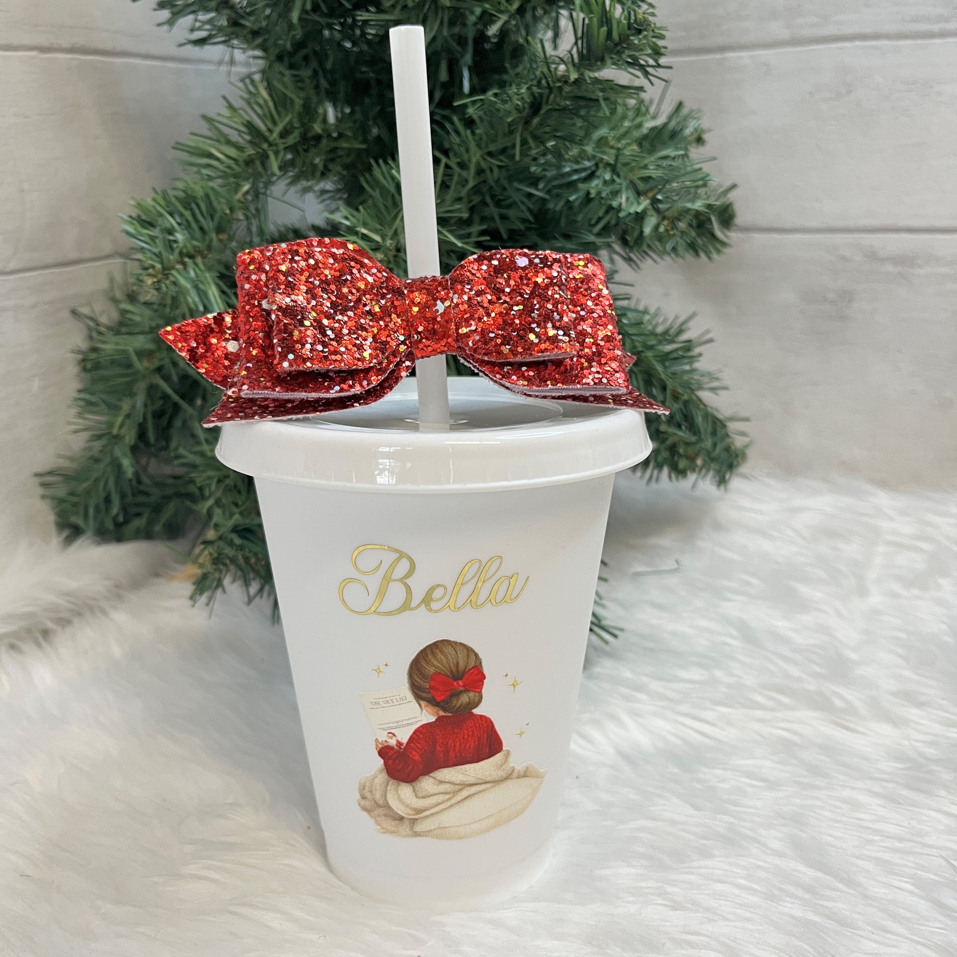 White cup with red glitter bow and White straw, featuring a little girl design with a personalised name in Gold Vinyl 