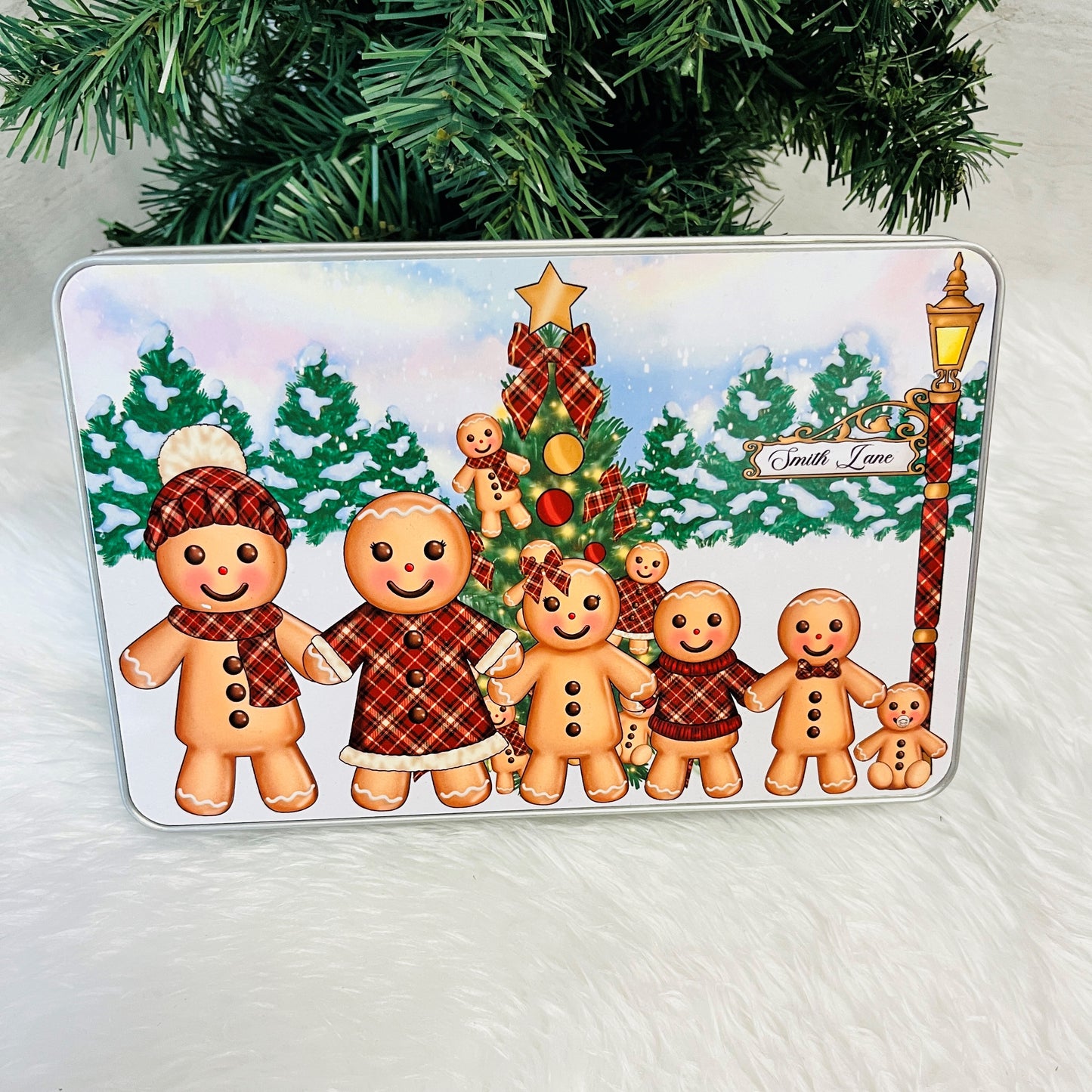 Gingerbread family scene with a Christmas tree on a Metal  Tin