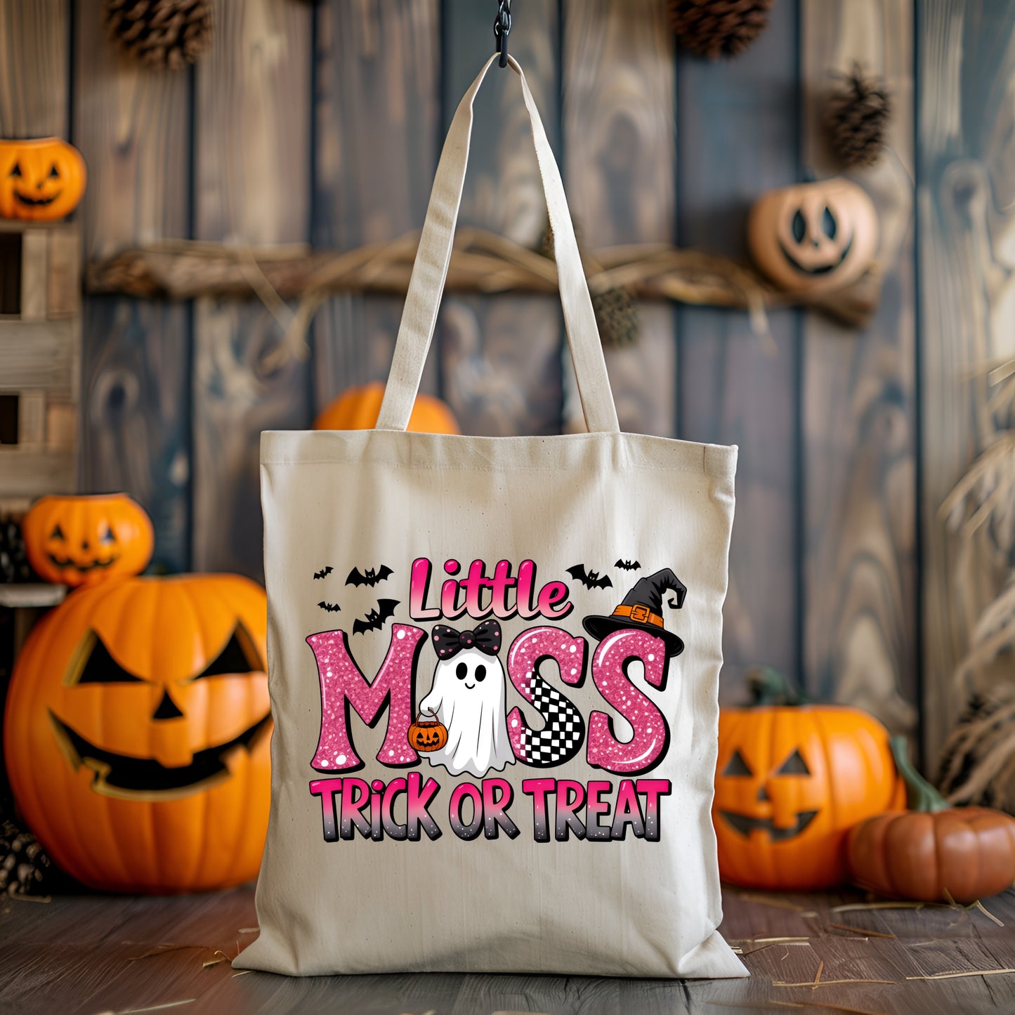 Halloween-themed tote bag with pumpkins and wooden wall background
