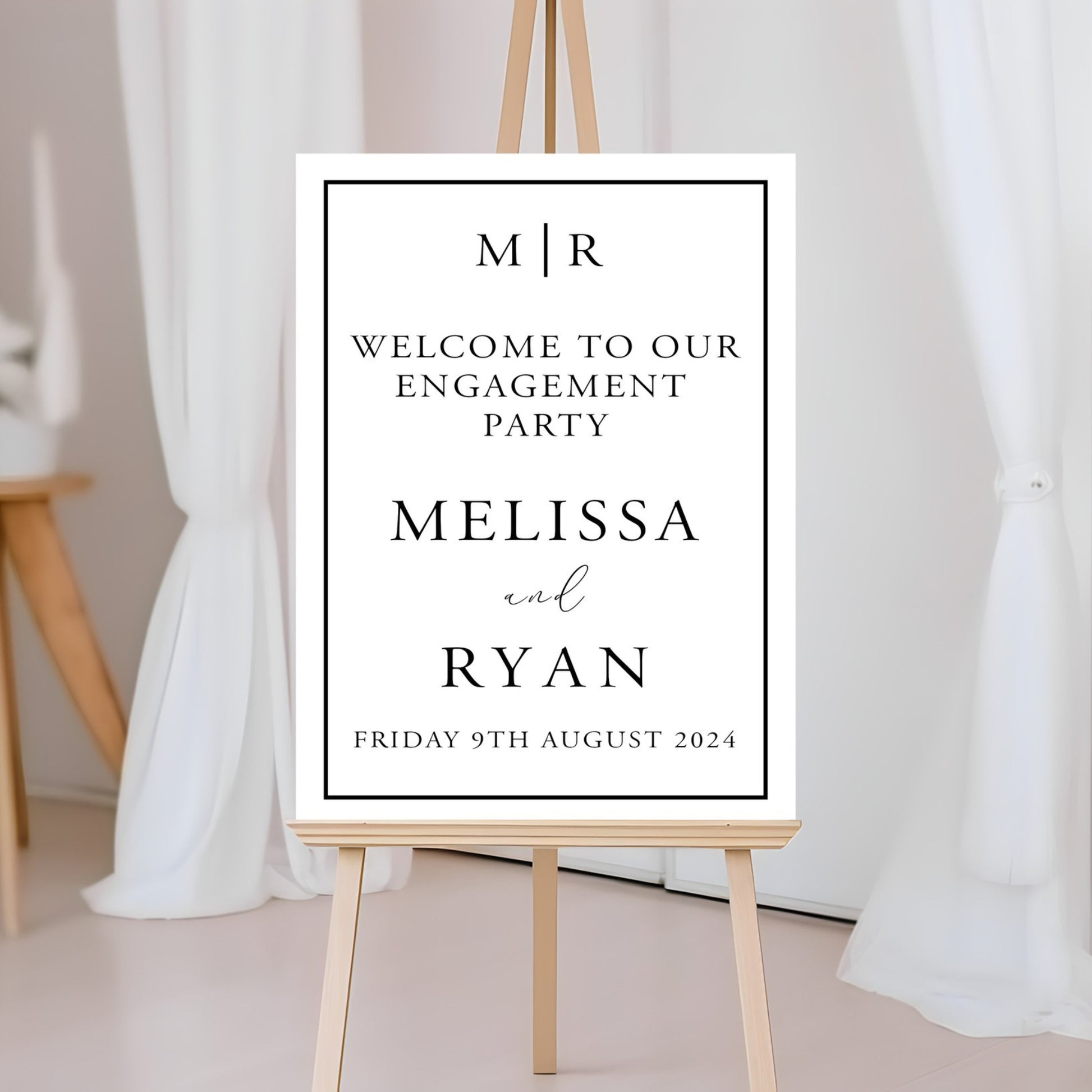 Engagement party A2 Printed Board on a stand with decorative elements.