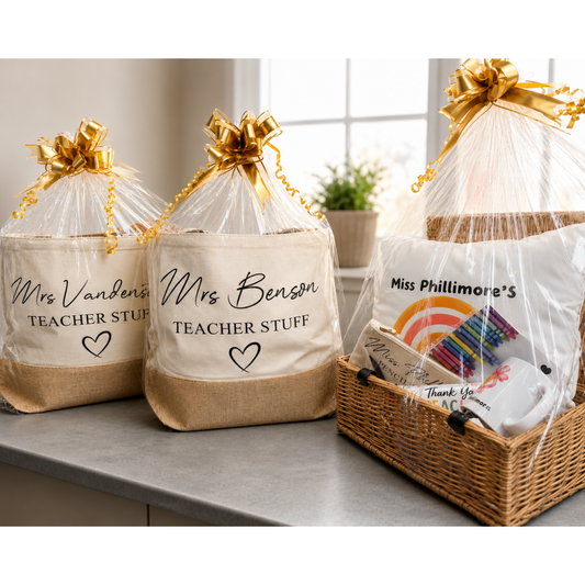 Two hessian Teacher Bags printed with Mrs Benson Teacher Stuff and wrapped in cellophane as a gift set
