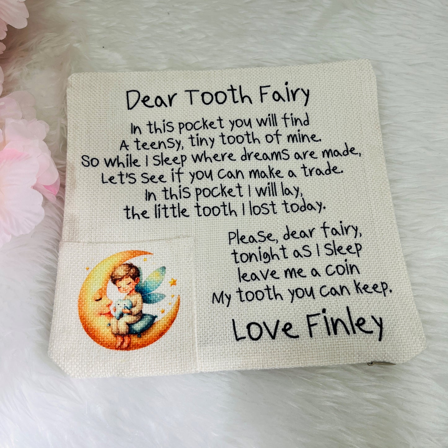 Note for the tooth fairy with a child's message and a tooth fairy illustration on a textured surface.