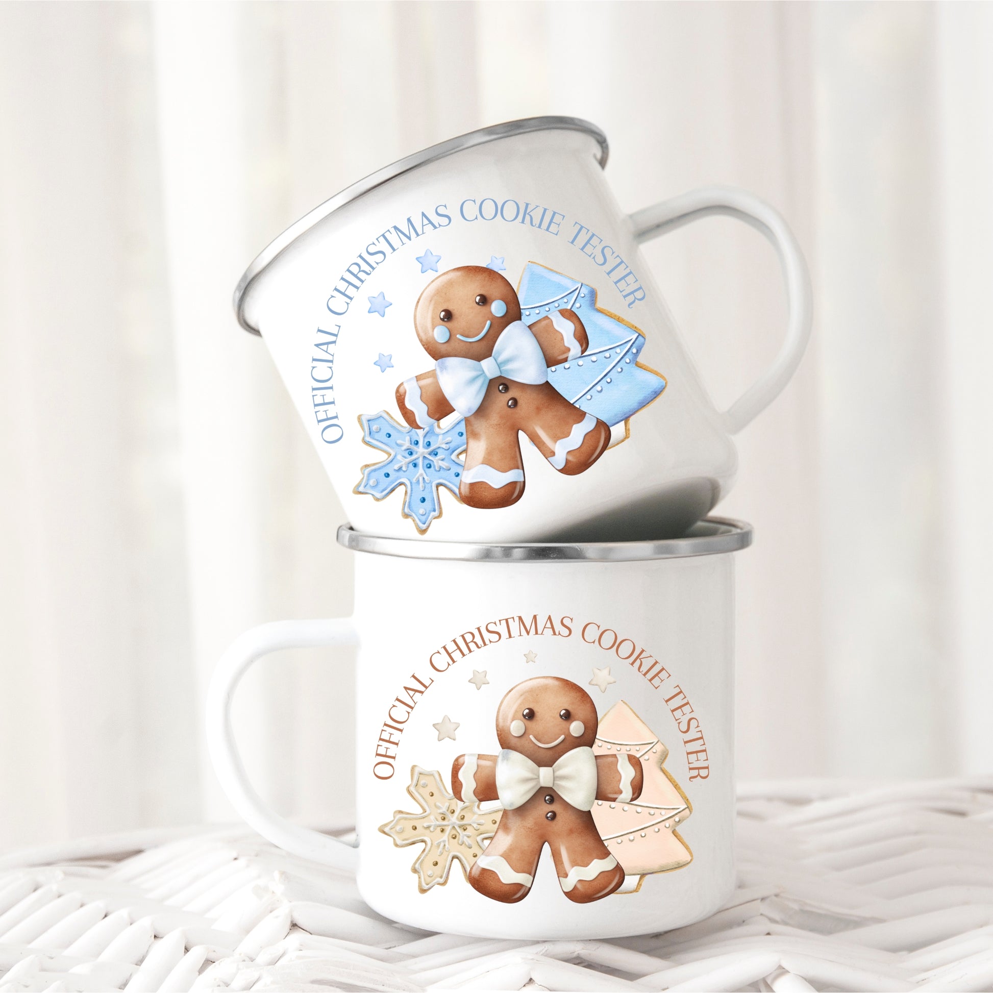 Two white mugs with gingerbread man design and text on a white background